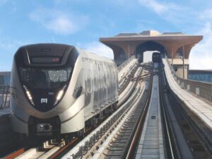 Doha metro train on tracks during daytime