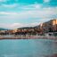 A sandy beach with blue waters and