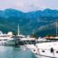 The photo highlights a relaxing coastal view in Tivat, making it a convenient location for visitors traveling from Tivat Airport to Tivat city center.