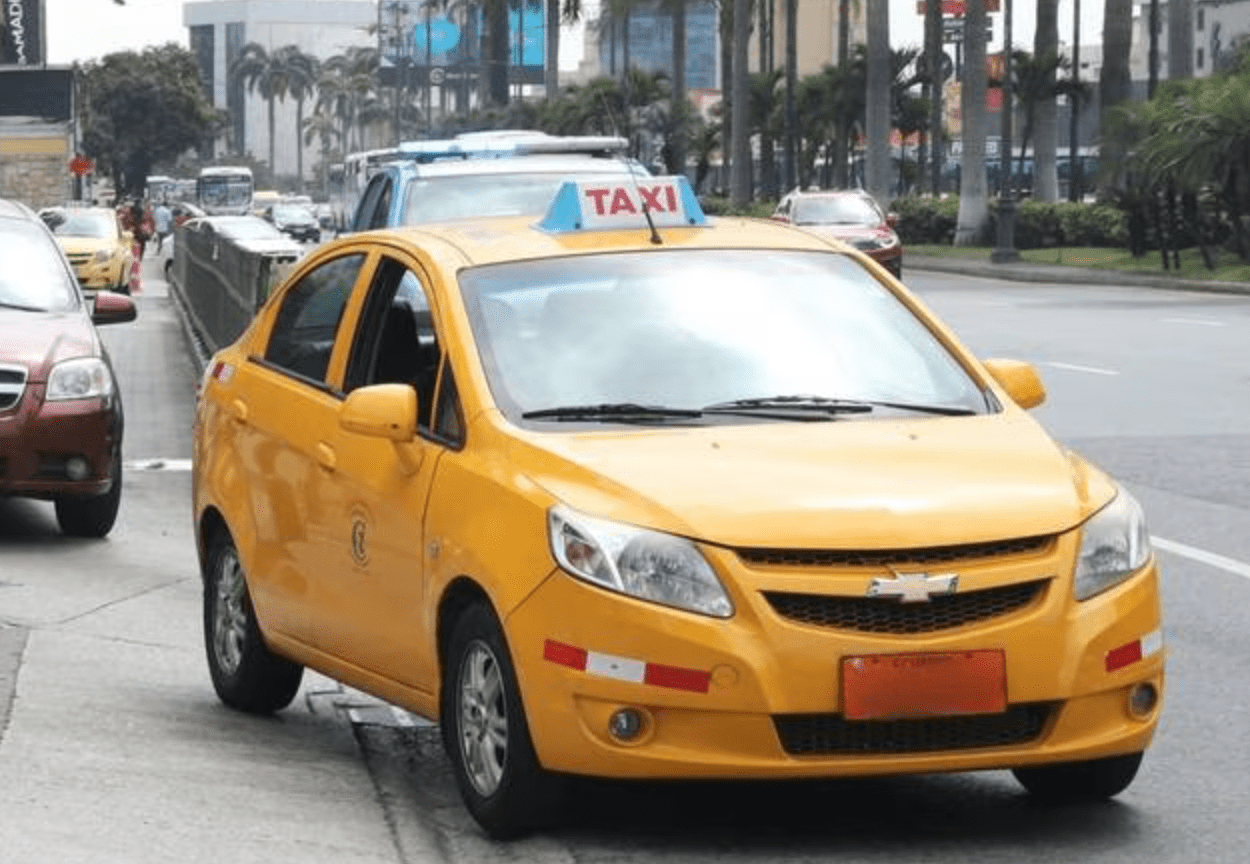 Guayaquil taxi A local yellow Guayaquil taxi in the street.