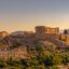 View of Acropolis of Athens with Parthenon and Erechtheion from Filopappou hill. Herodium, Lycabettus and Acropolis of Athens view from Filopappou hill a summer sunny day