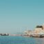 View of Chania Town and the port, with blue skies and waters.