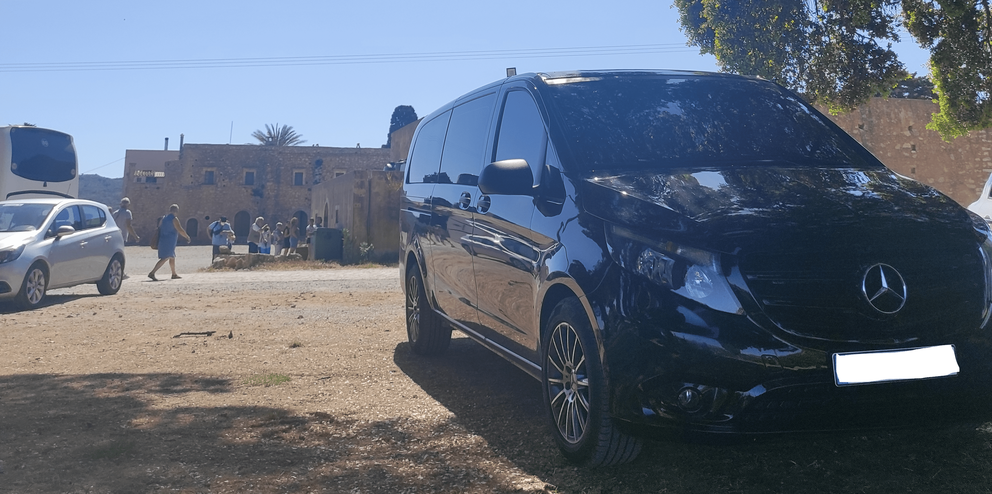 Crete Airport Taxi (Minivan) by Welcome Pickups A black Crete Airport Taxi (Minivan)