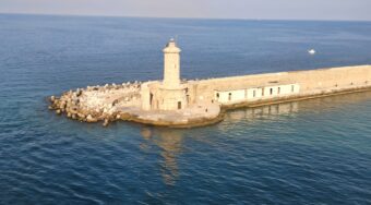 View of a lighthouse near the port of Civitavecchia, Italy.