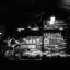 A black and white image of a street stall in Hat Yai.