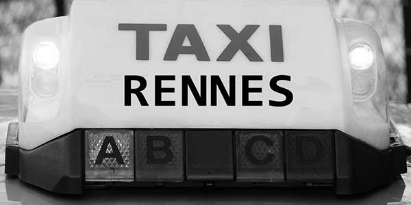 Rennes taxi Rennes Taxi sign on the top of a taxi cab