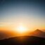The sun rising over the mountainous region of Leon in Nicaragua, highlighting the peak of the El-Hoya volcano.