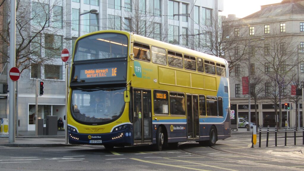 A yellow double-decker Dublin Bus