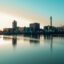 A view of Moncton city reflected in the calm waters of the Tidal Bore Petitcodiac River.