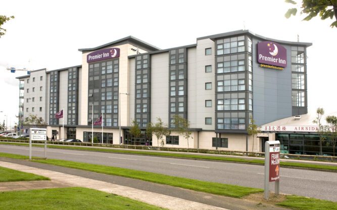 A front view of Premier Inn Dublin Airport during the day.
