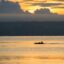 A man on a small boat near Samal Island.