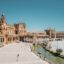 rivate airport transfer in Seville arriving at the magnificent Plaza de España with its historic fountains and arches