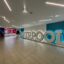 A large Liverpool sign on the ground inside the Liverpool Airport terminal.