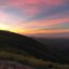 Colourful sunset over a silhouette of a mountainside in Port au Prince, Haiti.