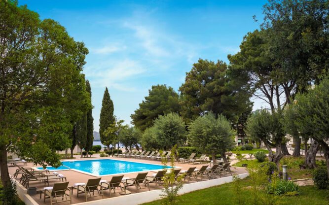 A view of the Mediterranean garden and swimming pool of the Remisens Hotel Epidaurus near Dubrovnik Airport