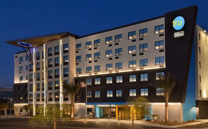 The True by Hilton Las Vegas Airport Hotel lit up at night