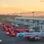 A row of Air Asia planes at the Kuala Lumpur International Terminal