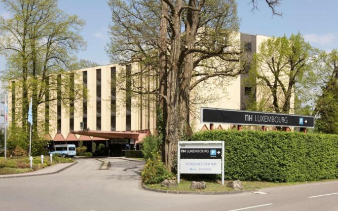 A photo of the entrance to the NH Luxembourg hotel building near Luxembourg Airport