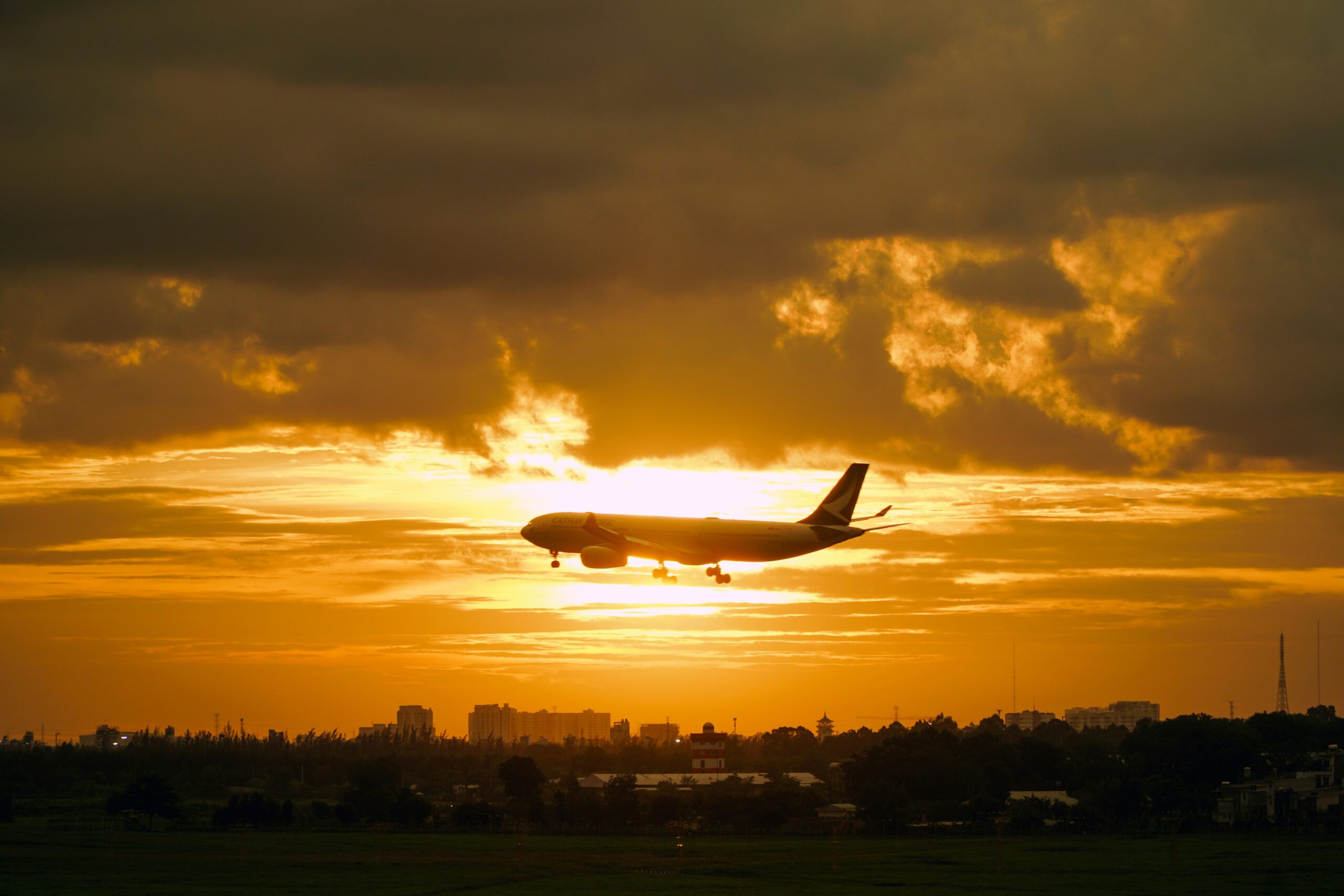 Plane takeoff during sunset