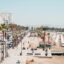 Aerial view of Larnaca beach and the buildings on a sunny day. Take a Larnaca taxi and start exploring.