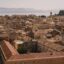Aerial view of terracotta buildings in Corfu town.