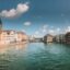 Buildings lining both sides of a body of water, in central Zurich.
