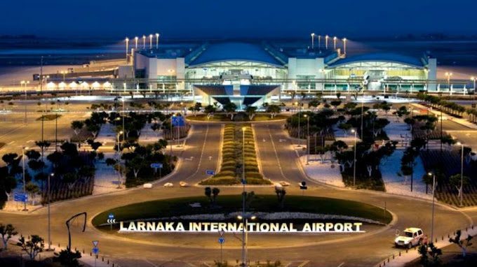 Larnaca International Airport sign at night