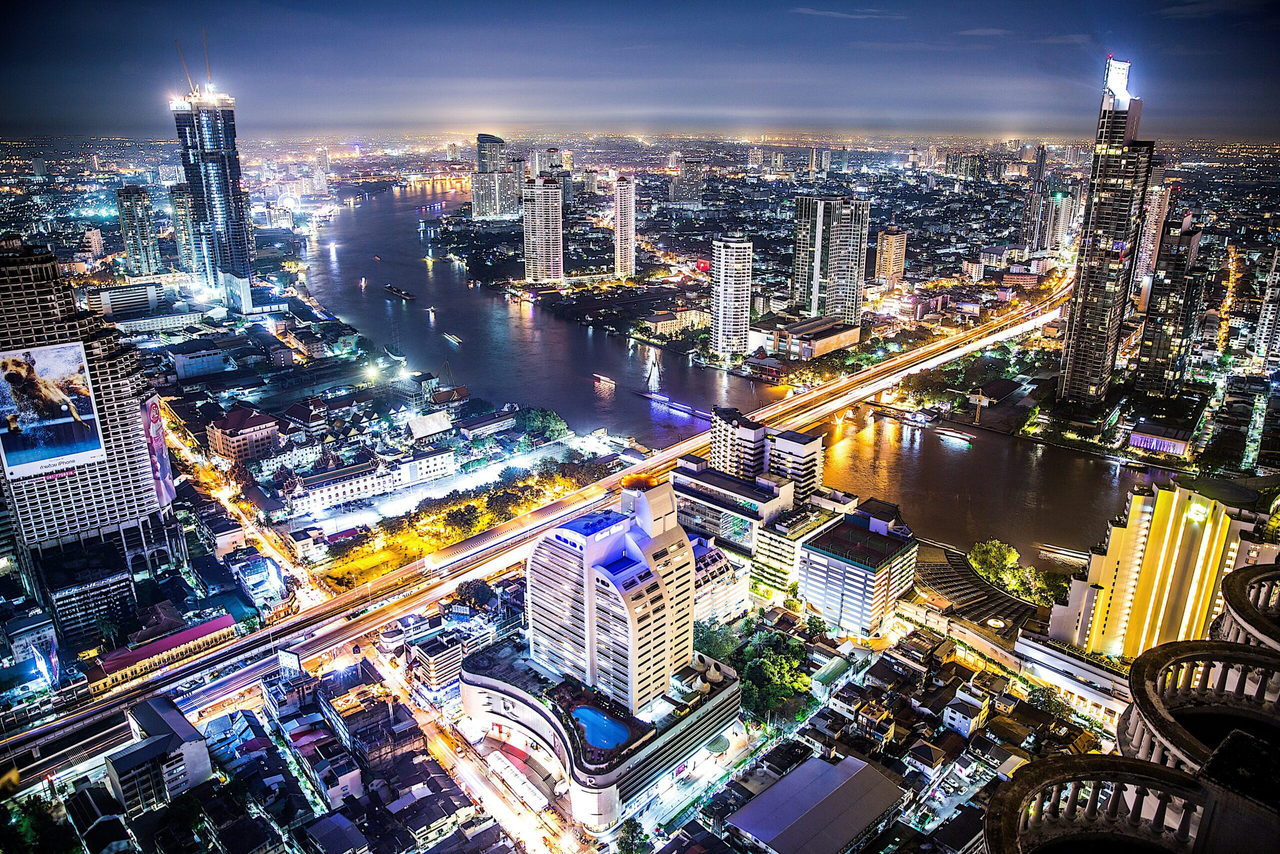 A view of Bangkok City lit up at night.
