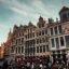 Grand-Place in Brussels filled with people and beautiful ornate buildings.