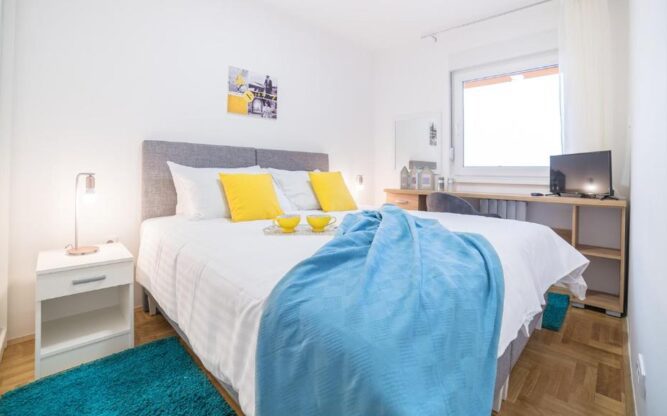 Bright and airy bedroom at Novel Inn Belgrade
