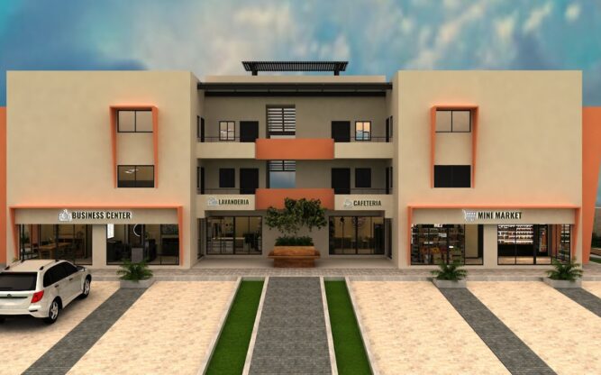 The front view of Suites Lomboy & Plaza painted orange and beige with a laundry, business center, mini mart and cafe.
