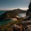 rock formations and sky over ocean waters