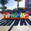 colorful Tijuana sign under a bright sun with a shadow