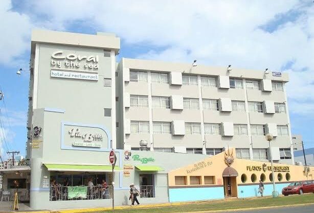 The front facade of the Coral by the Sea Hotel near San Juan Airport