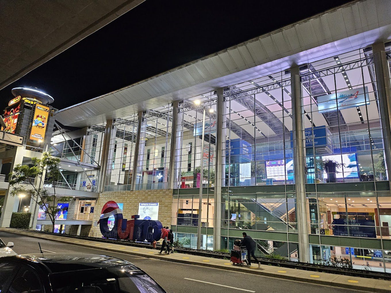 view out front of Quito Airport at night