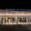 lit up Tahiti Airport sign at night