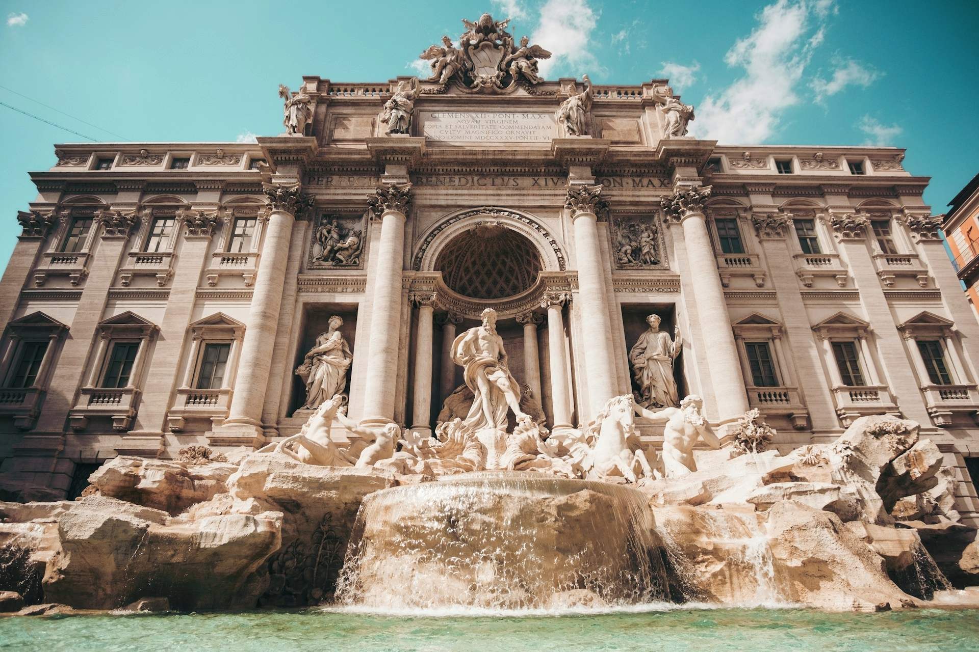 View of the Trevi Fountain in the city center of Rome.