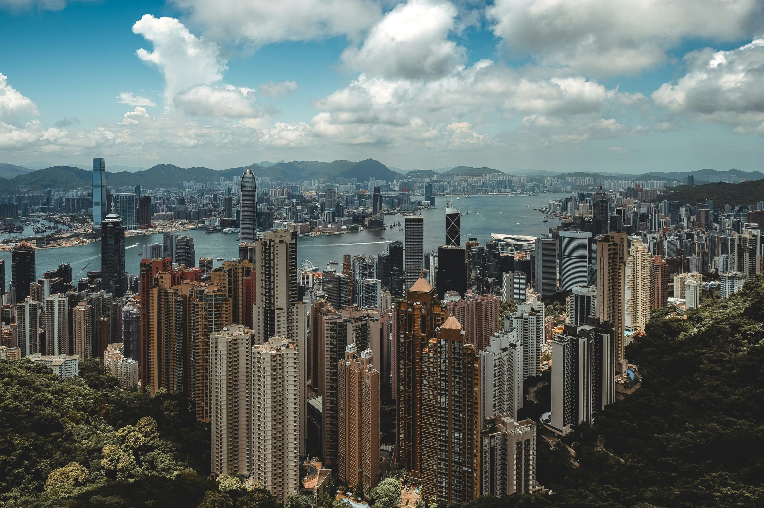 Hong Kong aerial view under a cloudy blue sky