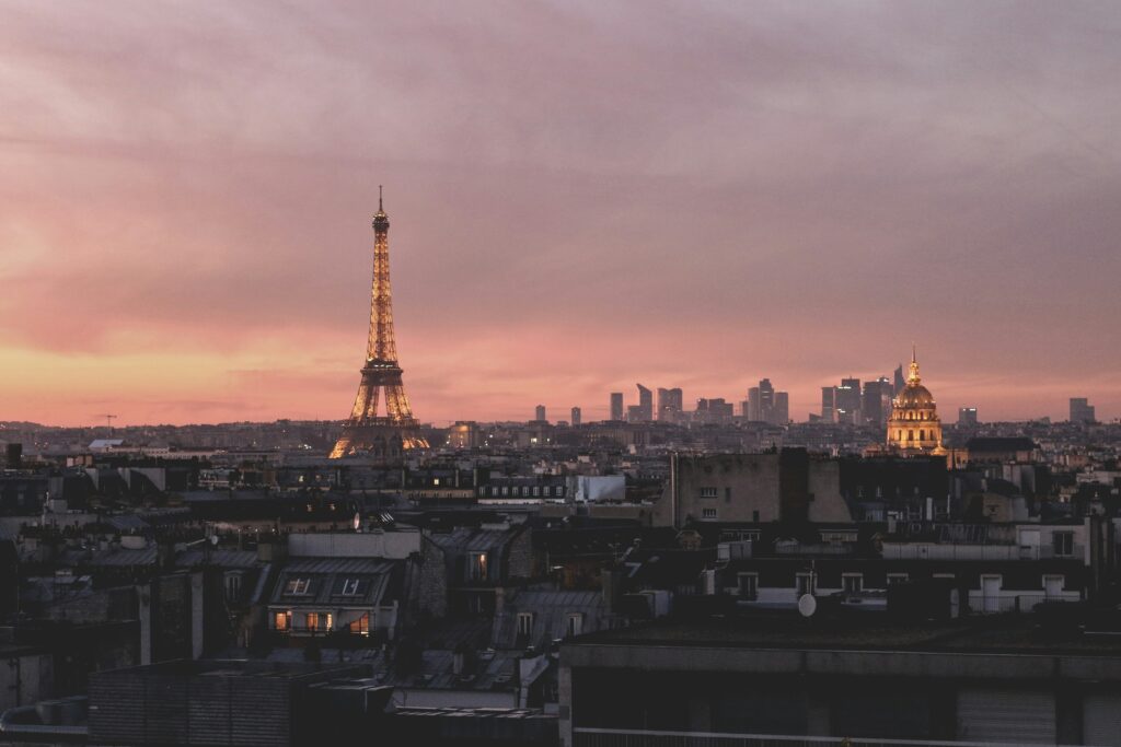 Sunset in Paris with the Eiffel Tower lit in the background