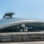 Incheon international Airport terminal building exterior view of AREX train station and Korean flags in Seoul South Korea
