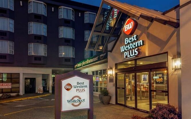 Entrance to the Best Western Plus Vancouver Airport Hotel at night.