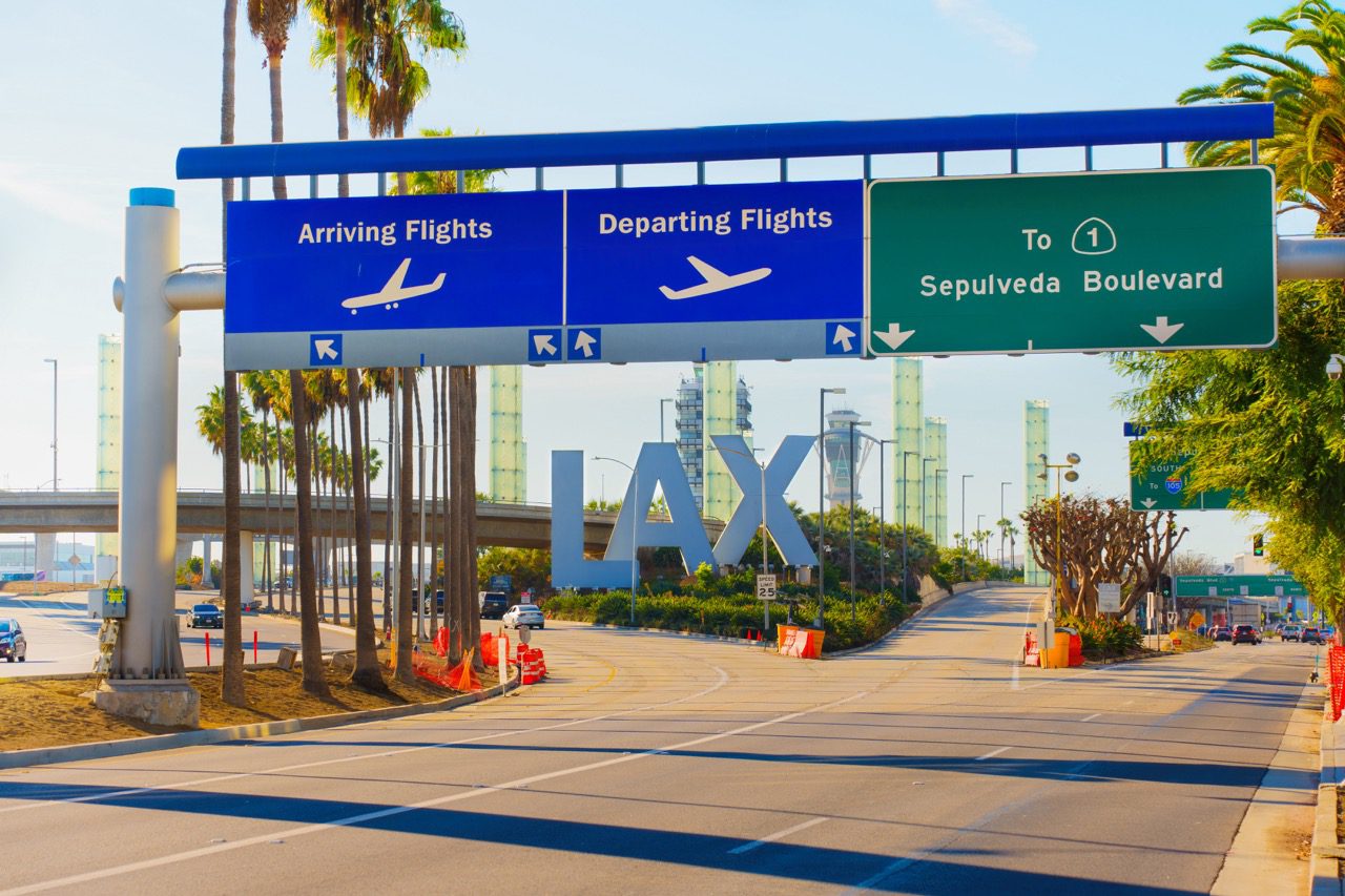 Los Angeles, California - January 6, 2025: Signage at Los Angeles International Airport indicating flight arrivals and departures along Sepulveda Boulevard.