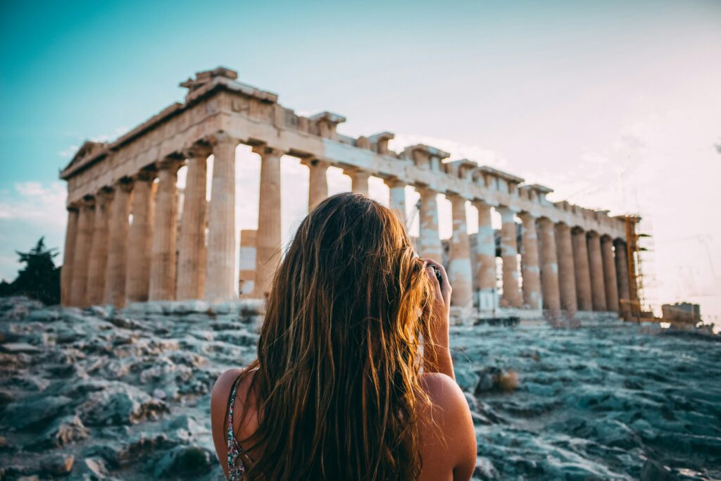 Tourist taking a photo of the Parthenon, Athens