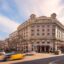 View of hotel el palace from the street in barcelona during the day