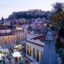 Lisbon in winter time. Dusk as the lights come on and the sun sets.