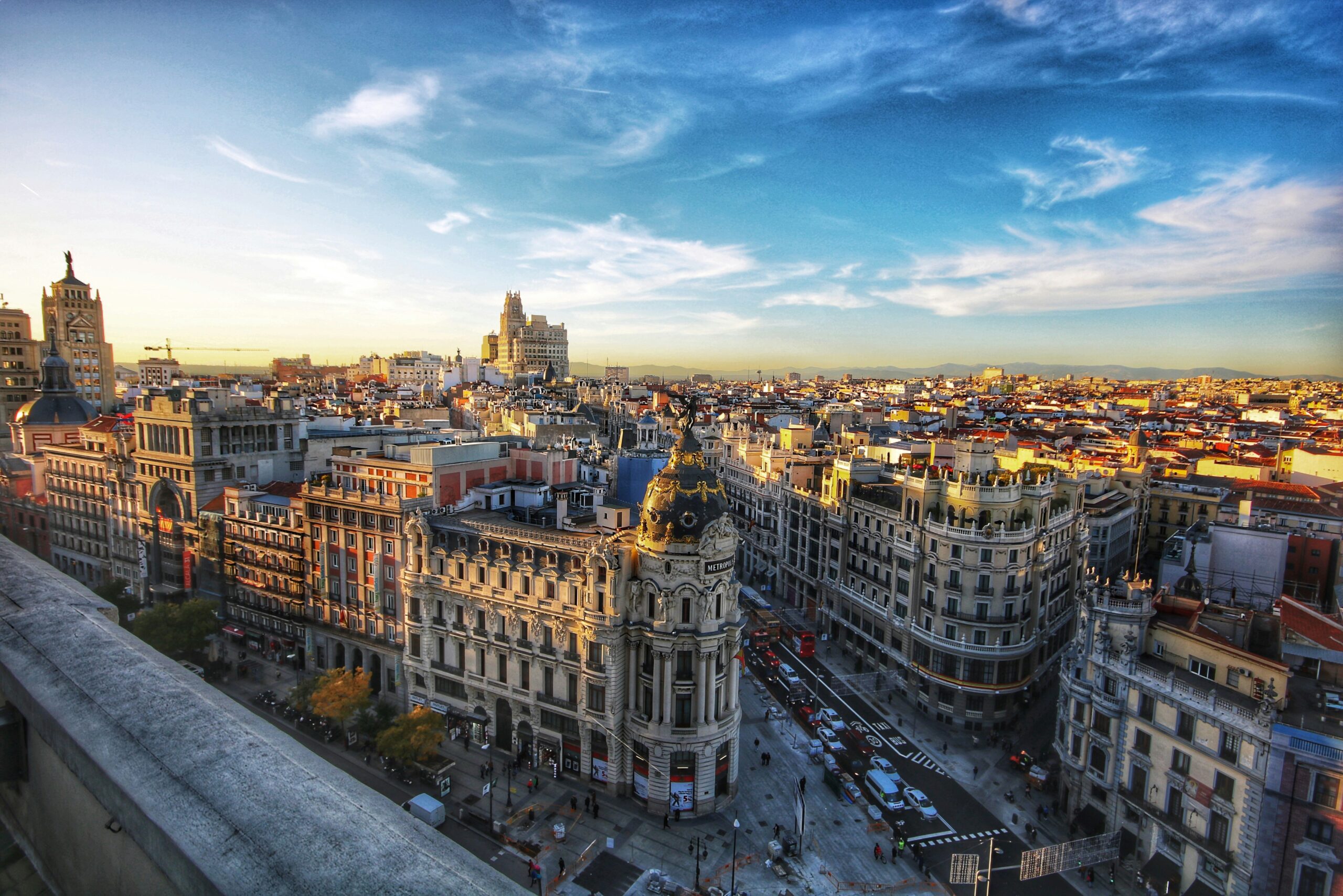 Madrid cityscape under a bright blue sky