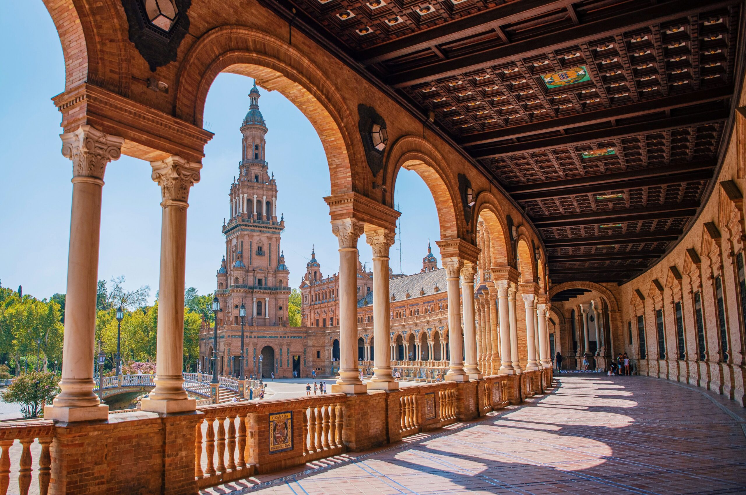 View of a temple through large columns in Seville.