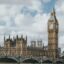 View of the Big Ben clock tower and the Palace of Westminster in London, a popular destination for tourists booking a London Airport taxi to the city center.