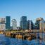 Modern Barcode district skyline in Oslo, Norway, reflecting on the water; a prime location for travelers booking an Oslo airport taxi to the city center.