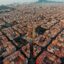 Aerial view of Barcelona with the Sagrada Família and the Eixample grid district, Spain